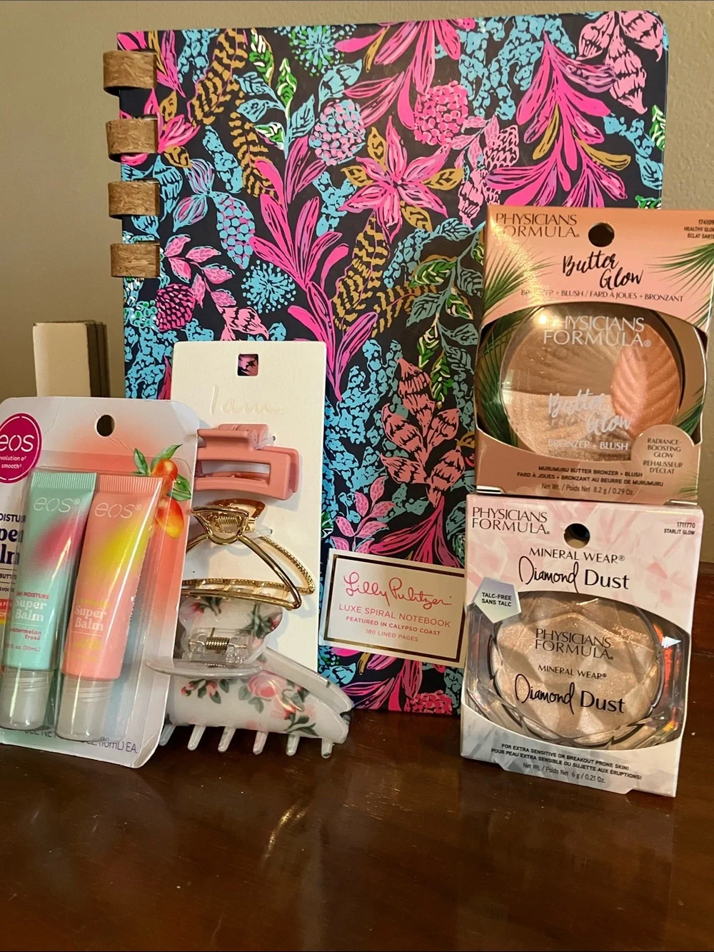 Lilly Pulitzer Notebook & 3hair clips, 2 PF Face powder, EOS lip&hand accessorys